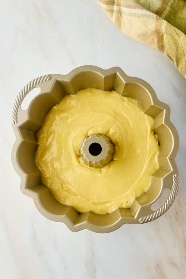 Overhead view of batter for limoncello cake in Bundt pan