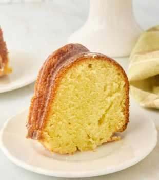 Slice of limoncello cake standing on plate