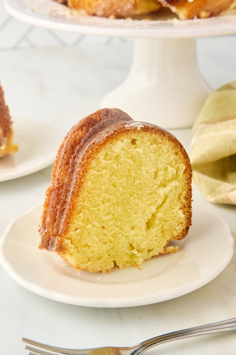 Slice of limoncello cake standing on plate