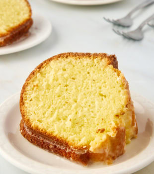 Moist limoncello cake slice on plate