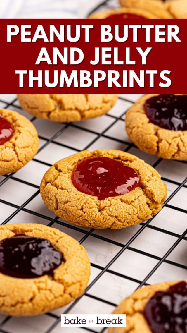 peanut butter and jelly thumbprint cookies on a wire rack; text overlay "peanut butter and jelly thumbprints bake or break"