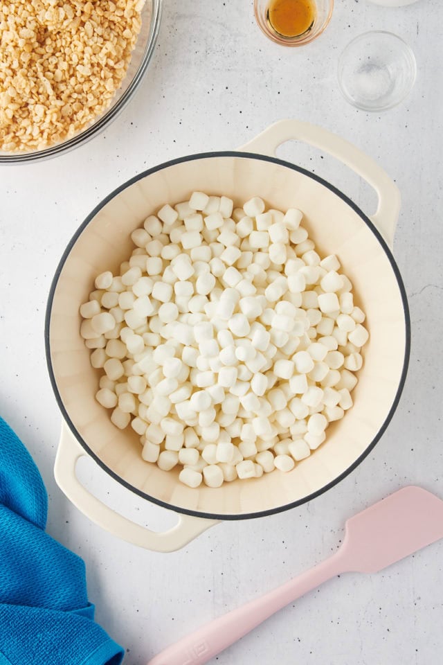 overhead view of mini marshmallows added to melted butter in a sauce pan