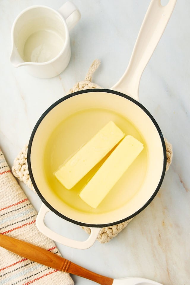 overhead view of butter and water in a saucepan