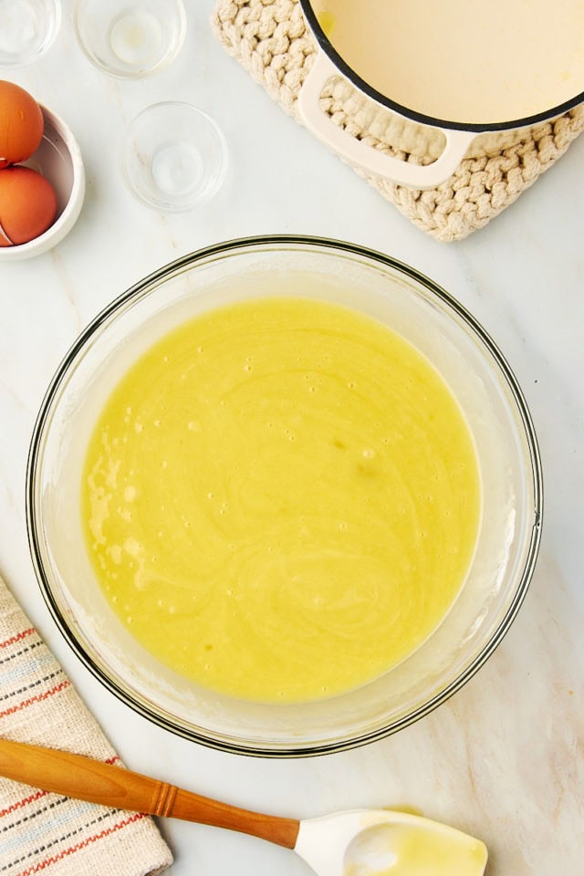 overhead view of mixed white Texas sheet cake batter in a mixing bowl