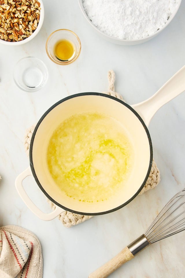 overhead view of butter and milk mixture for white Texas sheet cake frosting