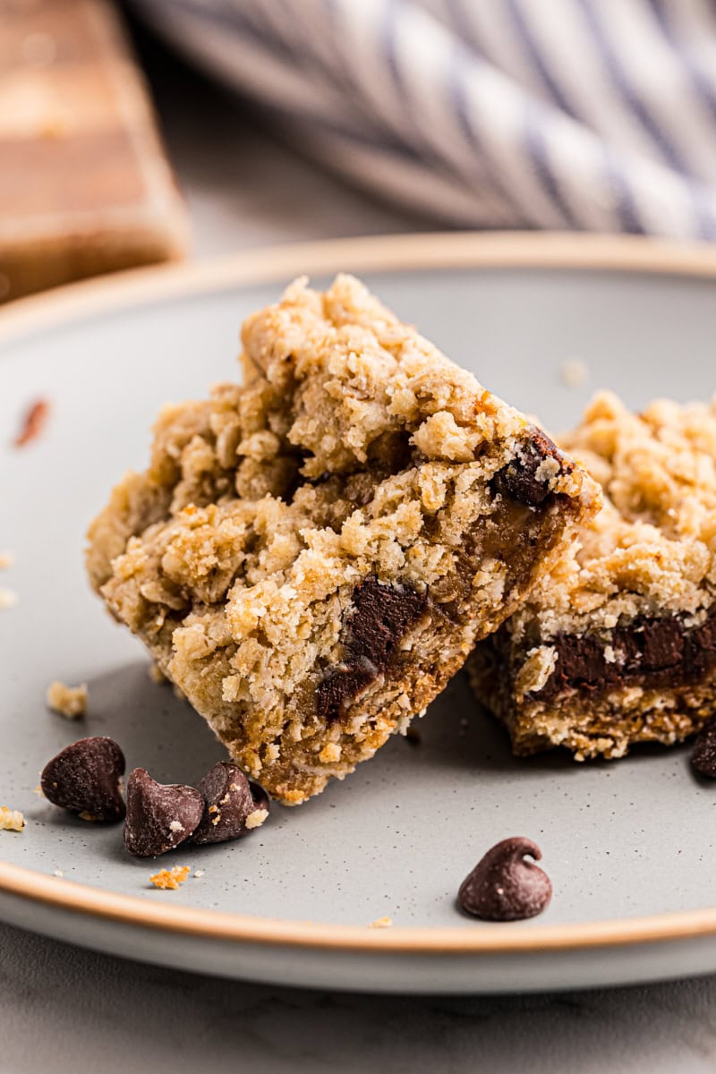 two caramel oatmeal bars on a plate