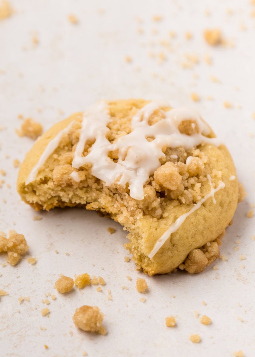 a coffee cake cookie with a bite missing