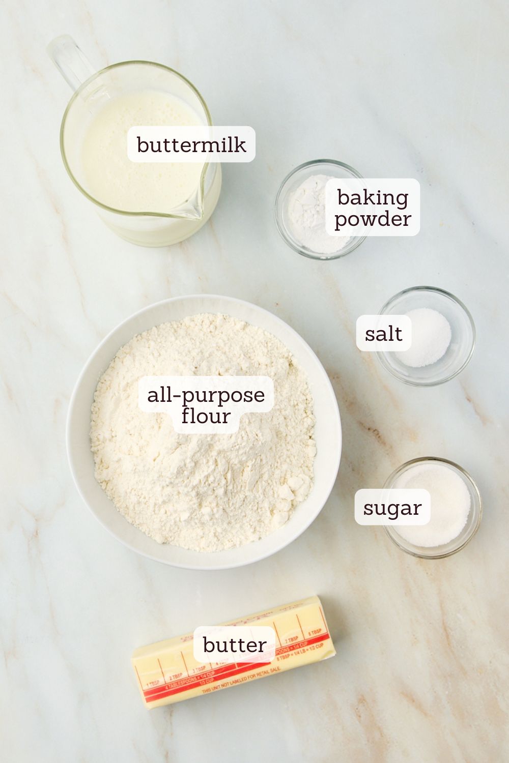 overhead view of labeled ingredients for butter swim biscuits