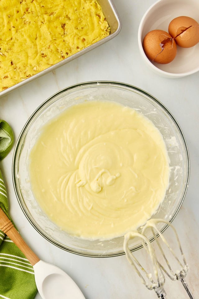 overhead view of mixed chess squares filling mixture in a glass mixing bowl