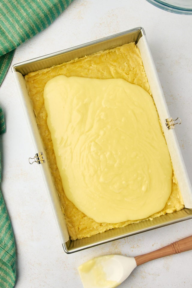 overhead view of gooey butter cake filling poured over crust