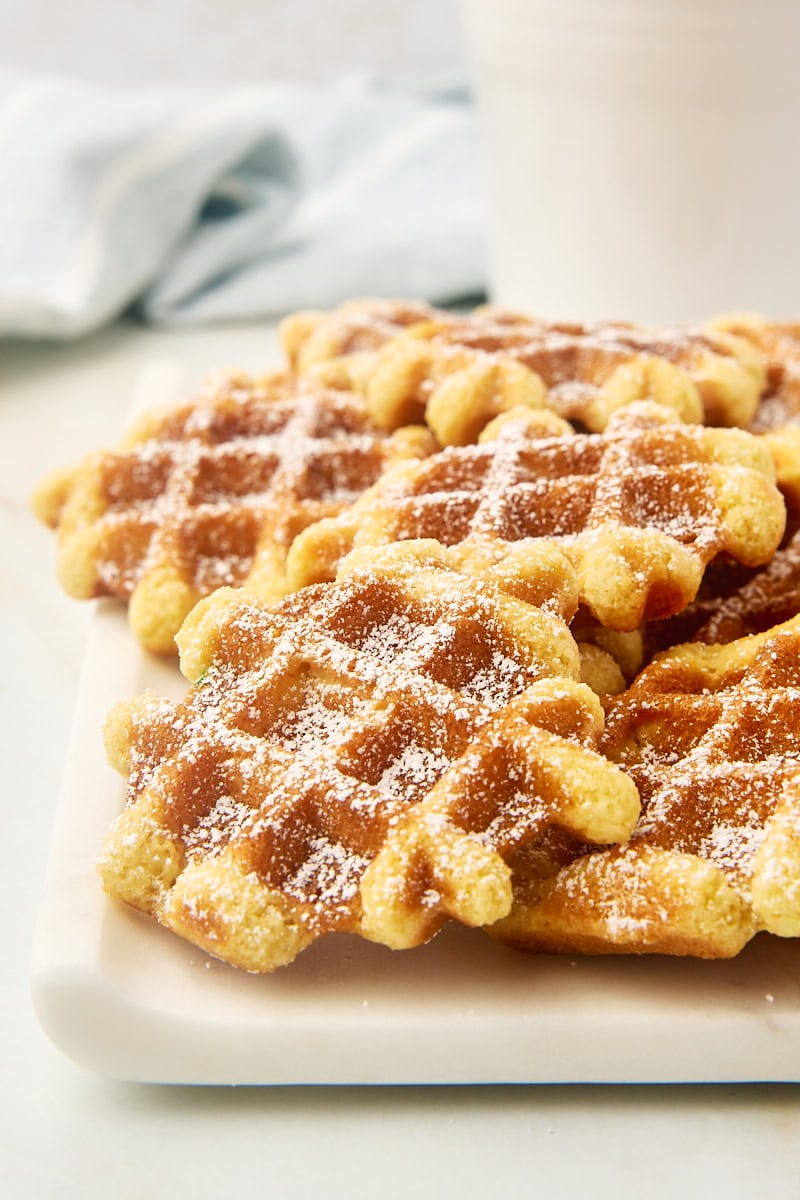 waffle cookies piled on a white plate