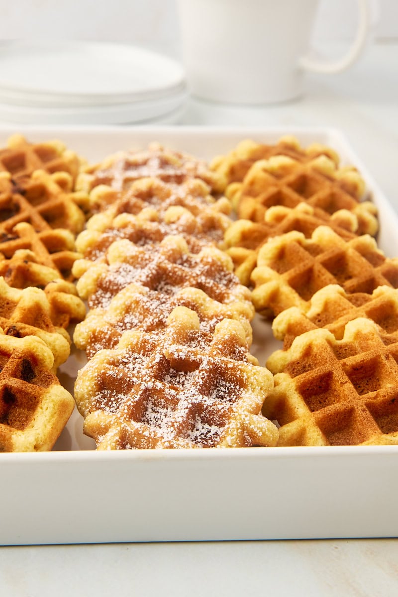 waffle cookies with various toppings and add-ins on a white serving tray