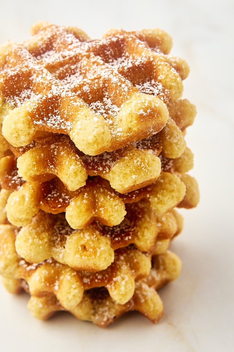 stack of waffle cookies on a marble countertop