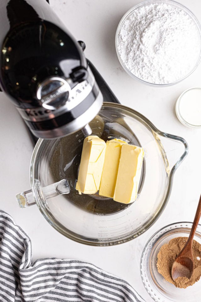 overhead view of butter in the bowl of a stand mixer