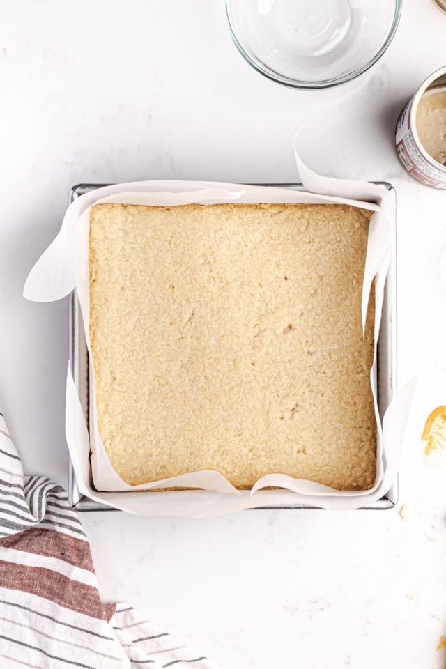 overhead view of freshly baked shortbread in a square baking pan