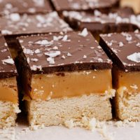 millionaire shortbread bars on parchment paper