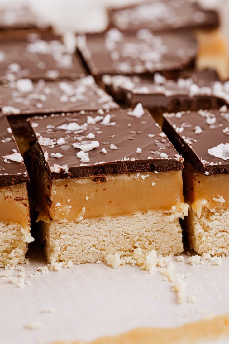 millionaire shortbread bars on parchment paper