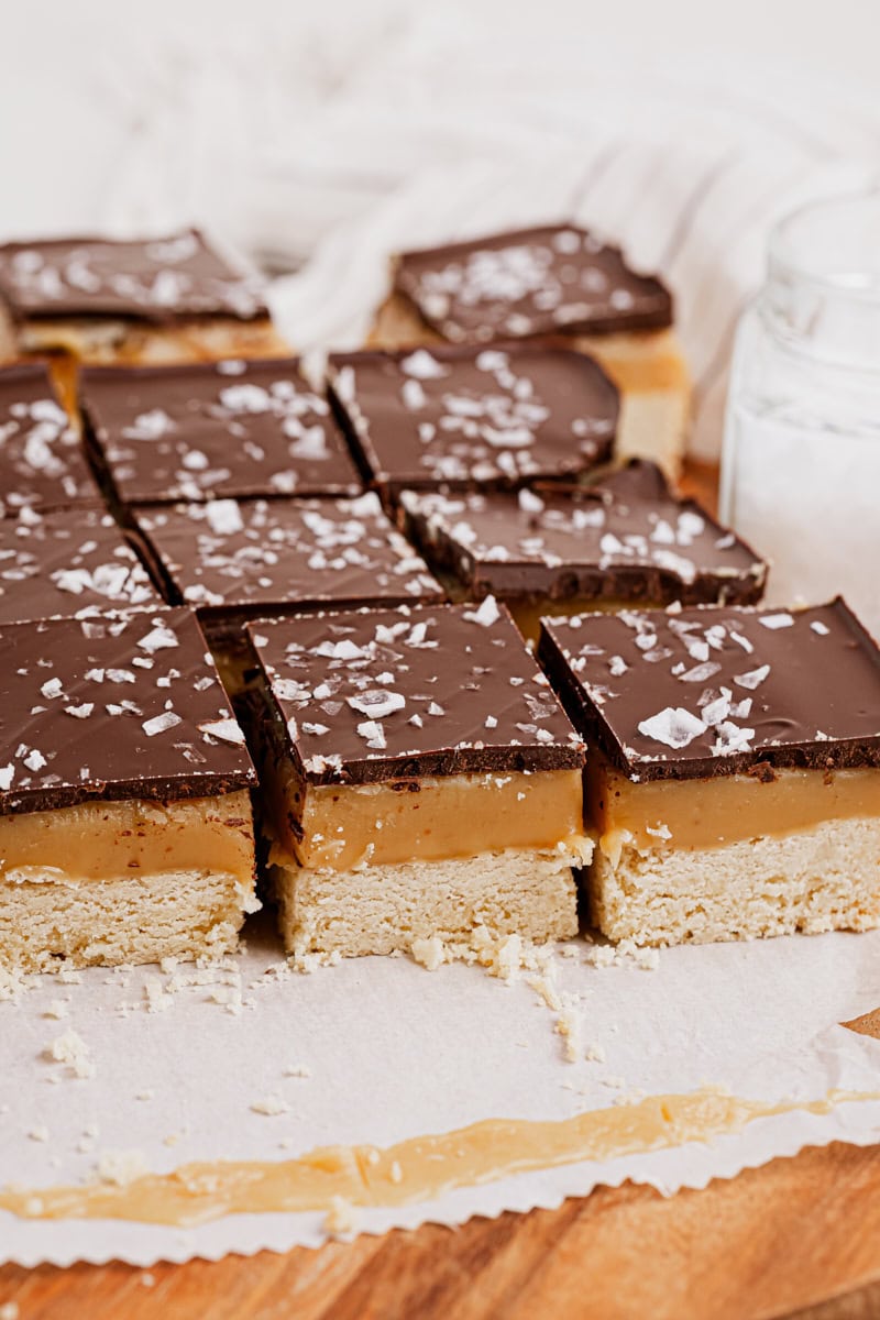 millionaire shortbread bars on parchment paper