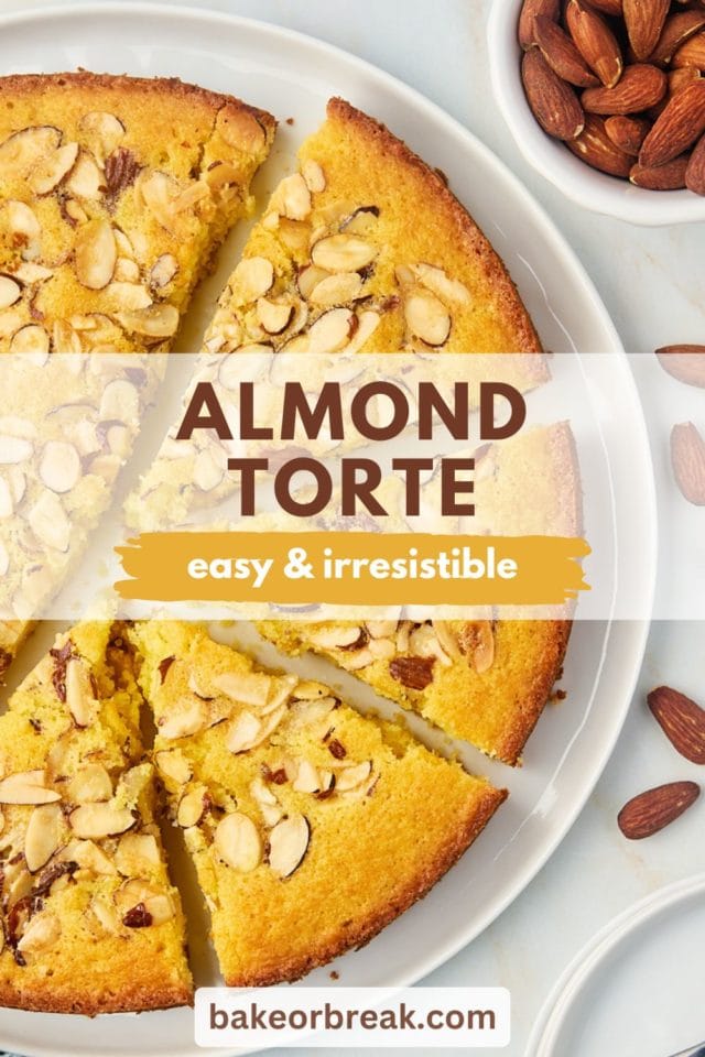 partially sliced almond torte on a white cake plate; text overlay "almond torte easy & irresistible bakeorbreak.com"