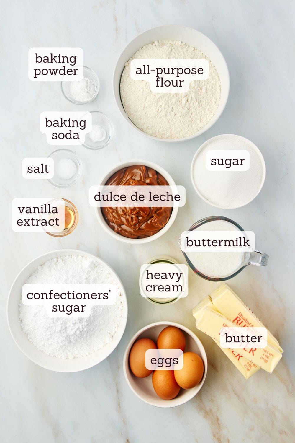 overhead view of labeled ingredients for dulce de leche cake