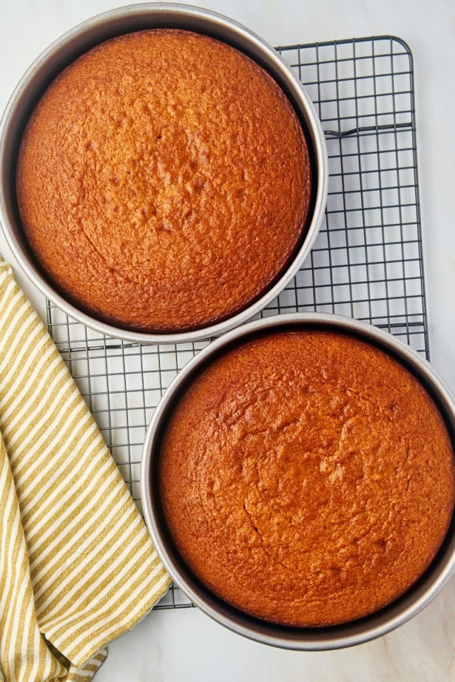 overhead view of freshly baked dulce de leche cake layers on a wire rack