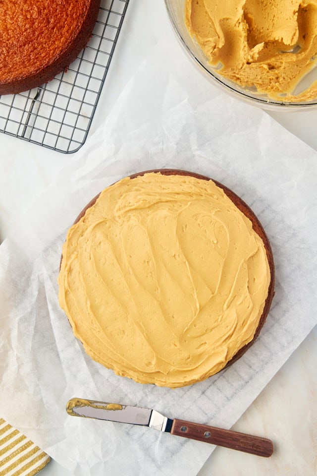 overhead view of a frosted dulce de leche cake layer