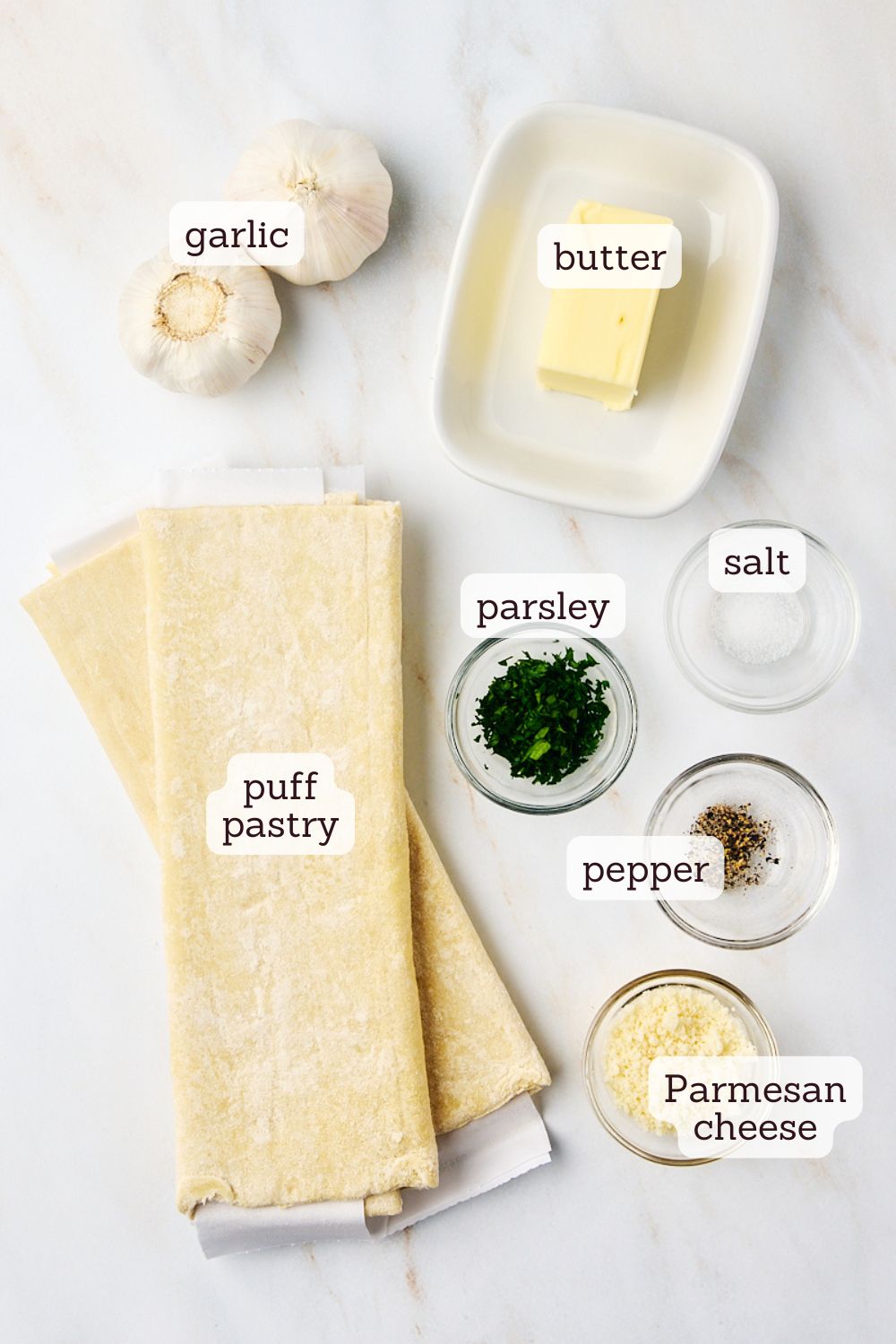 overhead view of labeled ingredients for garlic butter cruffins