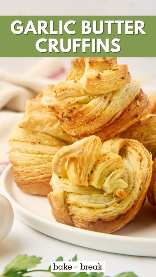 garlic butter cruffins on a white plate; text overlay "garlic butter cruffins bake or break"