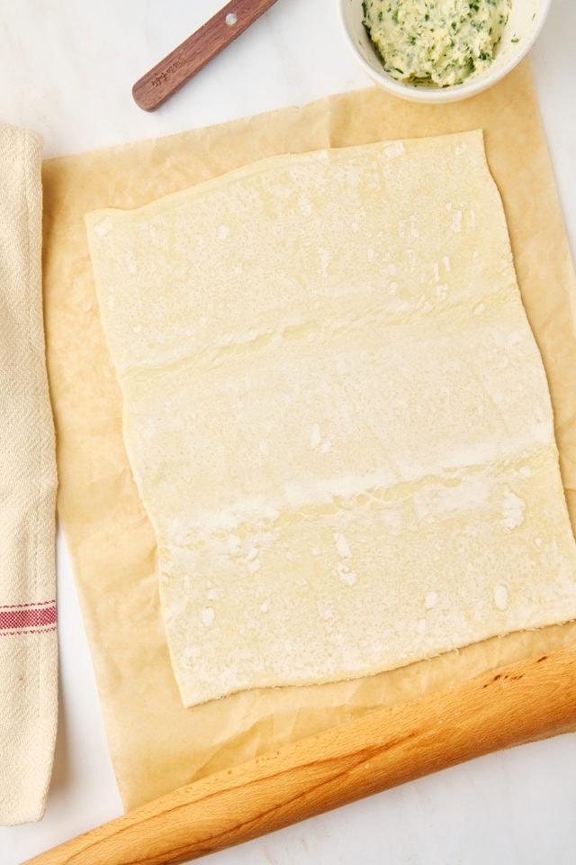 overhead view of puff pastry rolled into a large rectangle