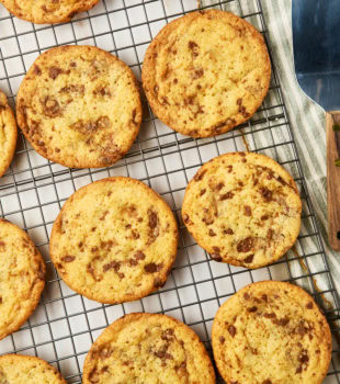 Overhead view of Heath bar cookies cooling on wire rack