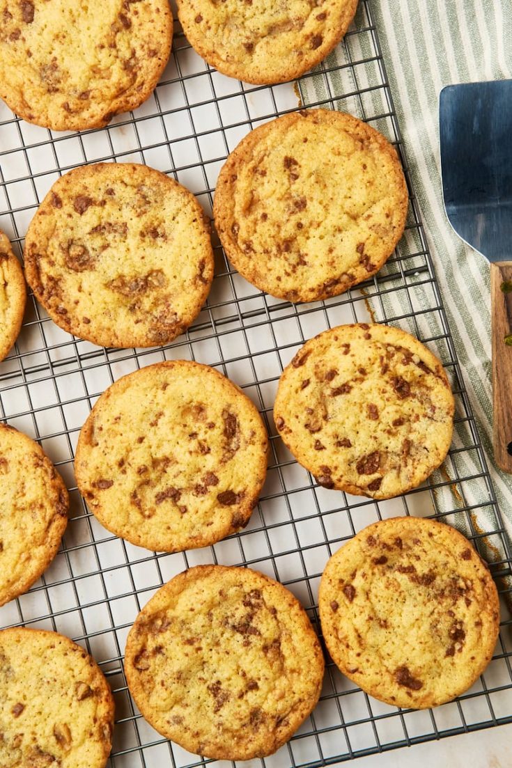 Overhead view of Heath bar cookies cooling on wire rack