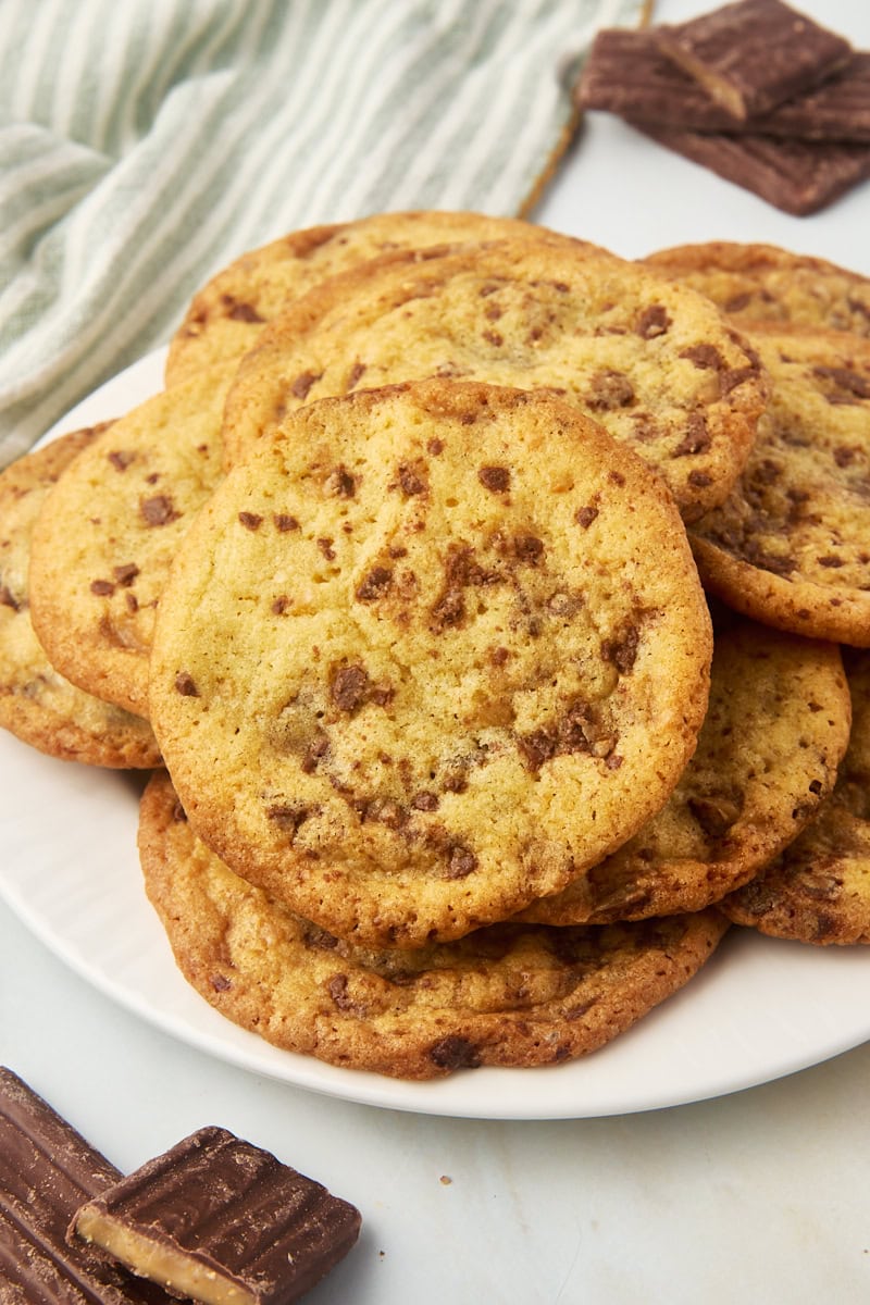 Heath bar cookies piled on plate