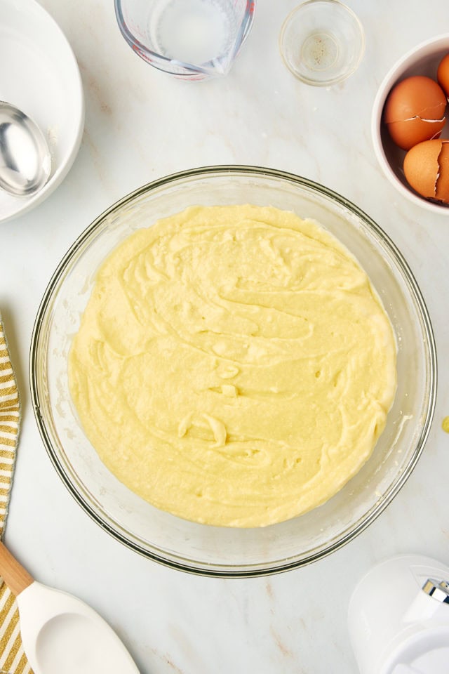 overhead view of mixed Kentucky butter cake batter in a glass mixing bowl