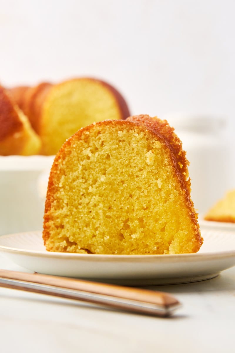 a slice of Kentucky butter cake on a white plate