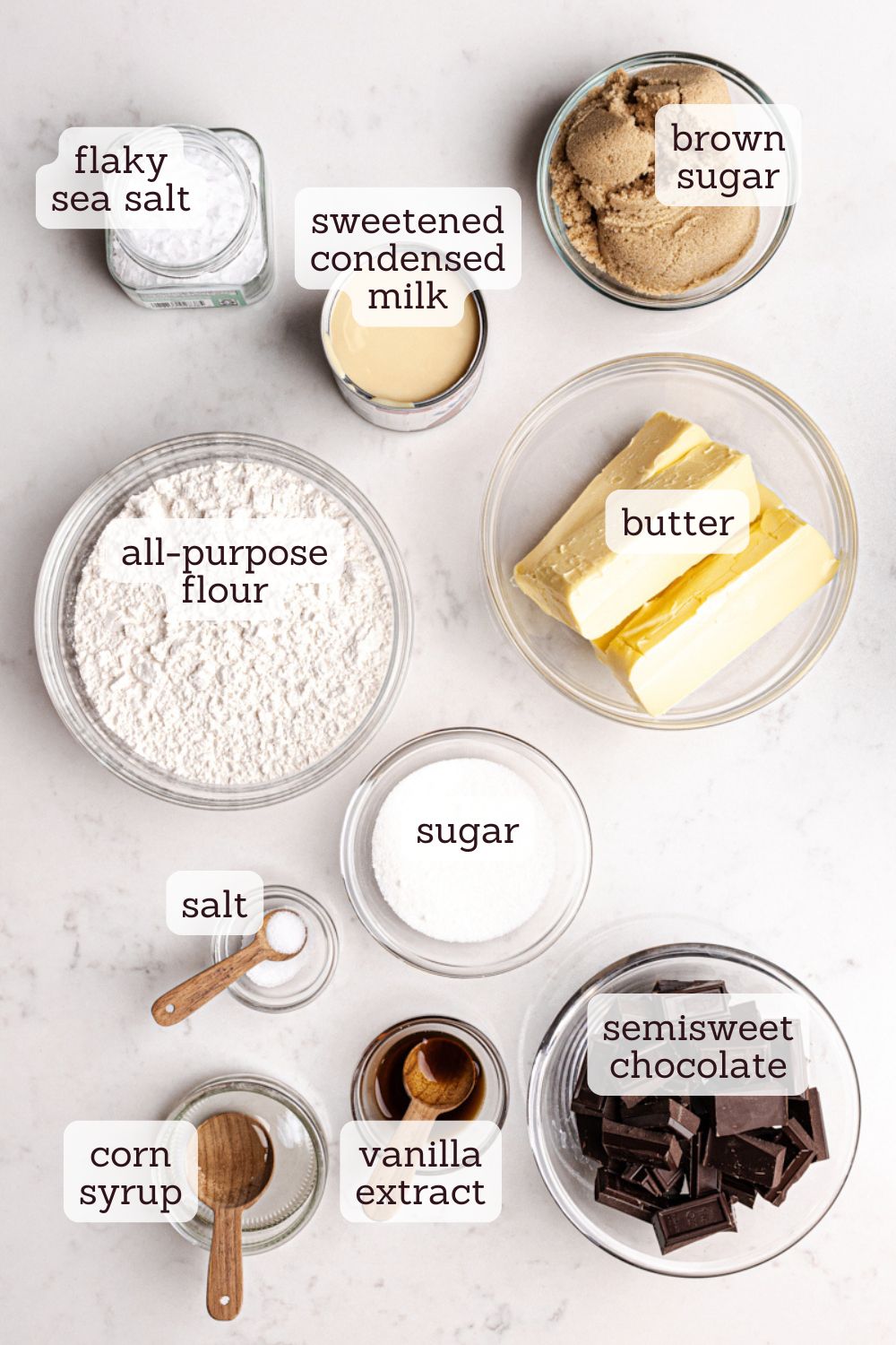 overhead view of labeled ingredients for millionaire shortbread bars