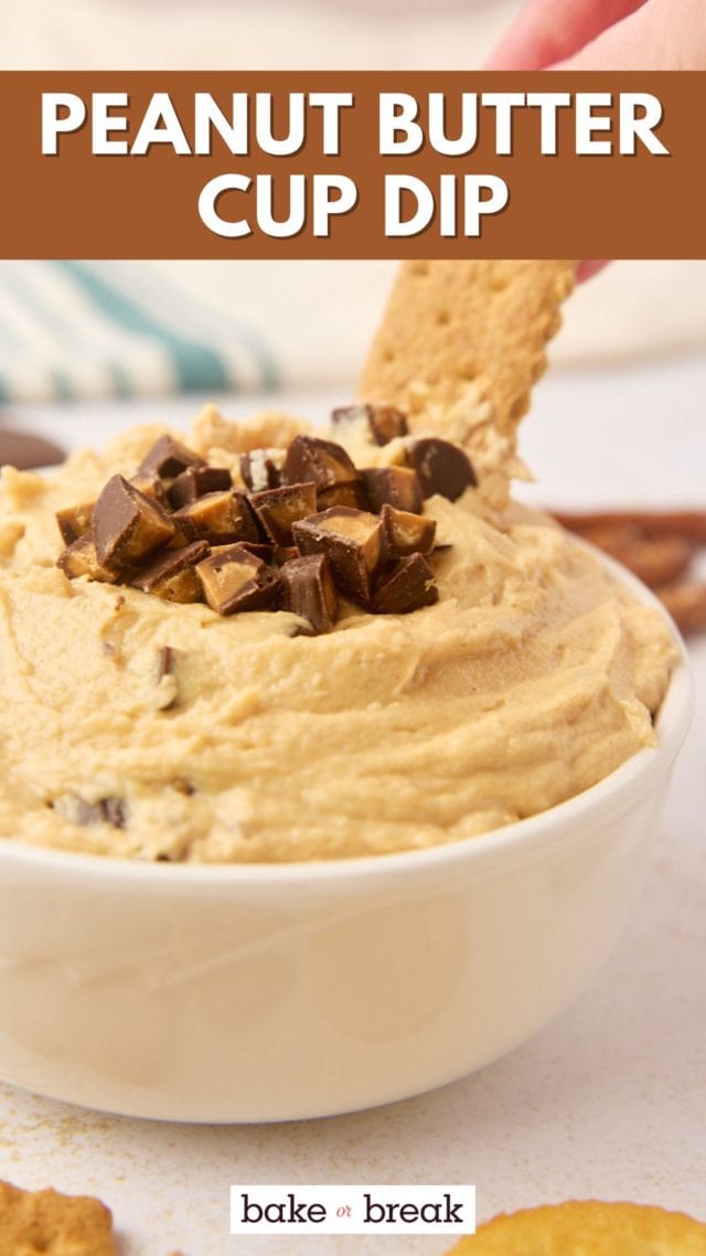 a graham cracker dipping into peanut butter cup dip; text overlay "peanut butter cup dip bake or break"