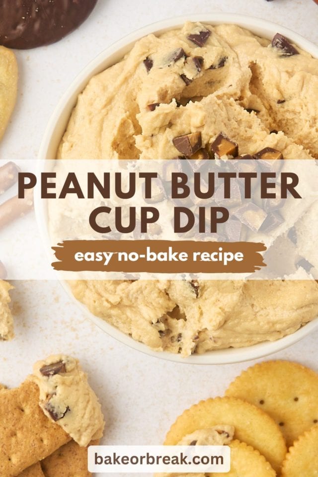 overhead view of peanut butter cup dip in a white bowl with various dippers surrounding the bowl; text overlay "peanut butter cup dip easy no-bake recipe bakeorbreak.com"