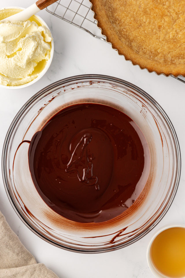 overhead view of melted chocolate in a glass bowl