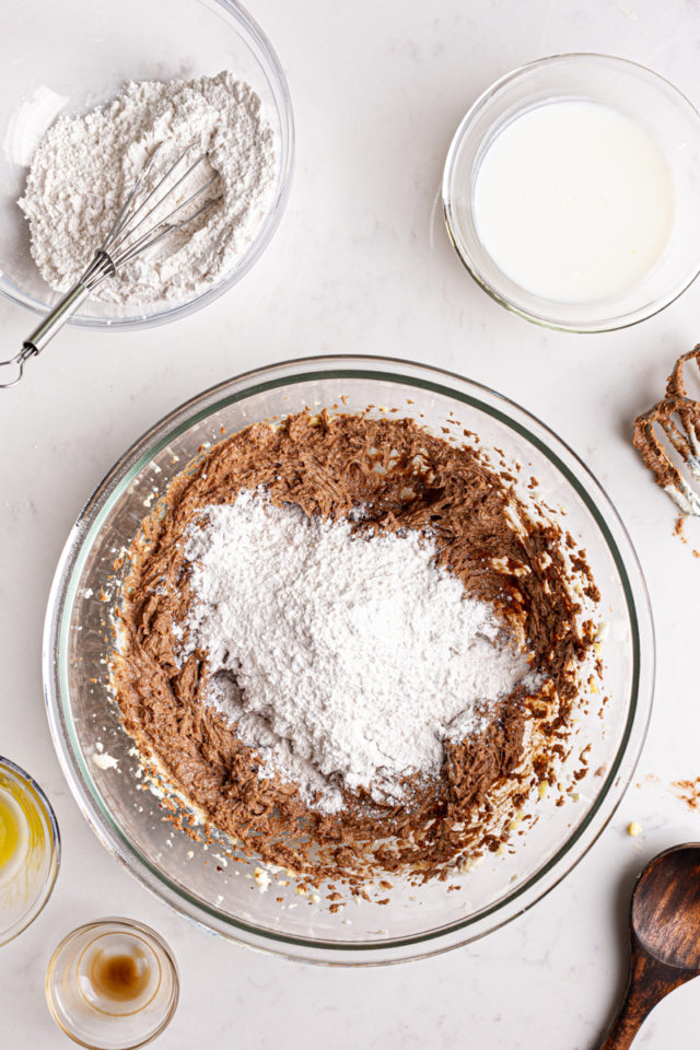 Adding dry ingredients to wet ingredients for German chocolate cake batter