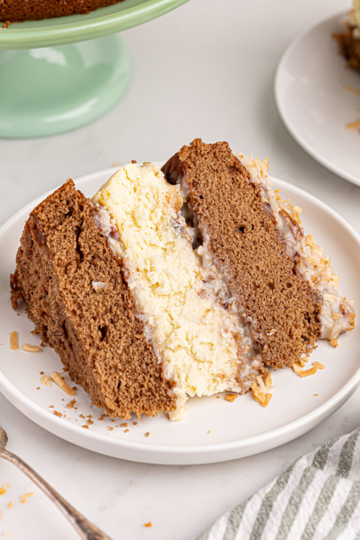 Slice of German chocolate cheesecake on plate