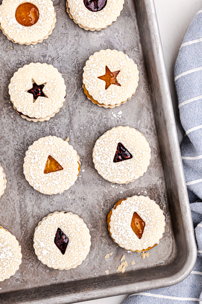 overhead view of Linzer cookies on a sheet pan