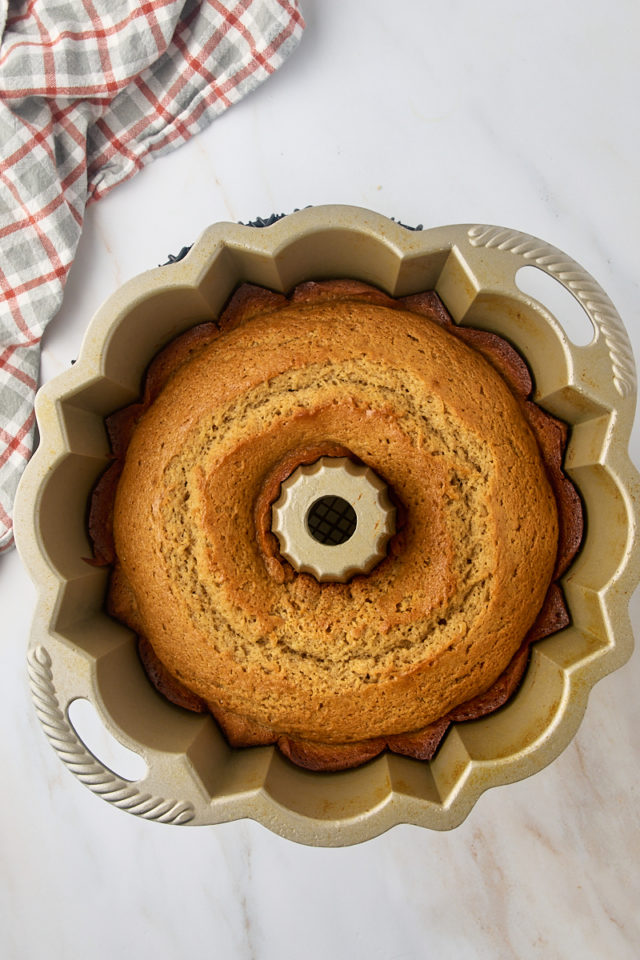 overhead view of freshly baked apple cider donut cake in a Bundt pan