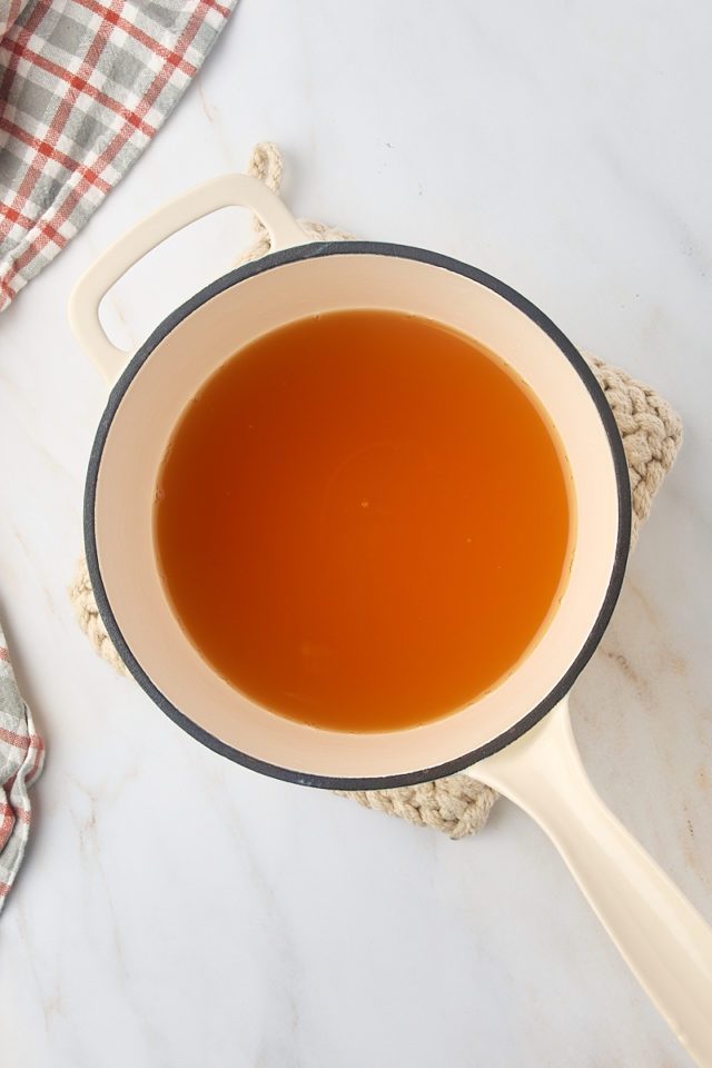 overhead view of apple cider in a saucepan