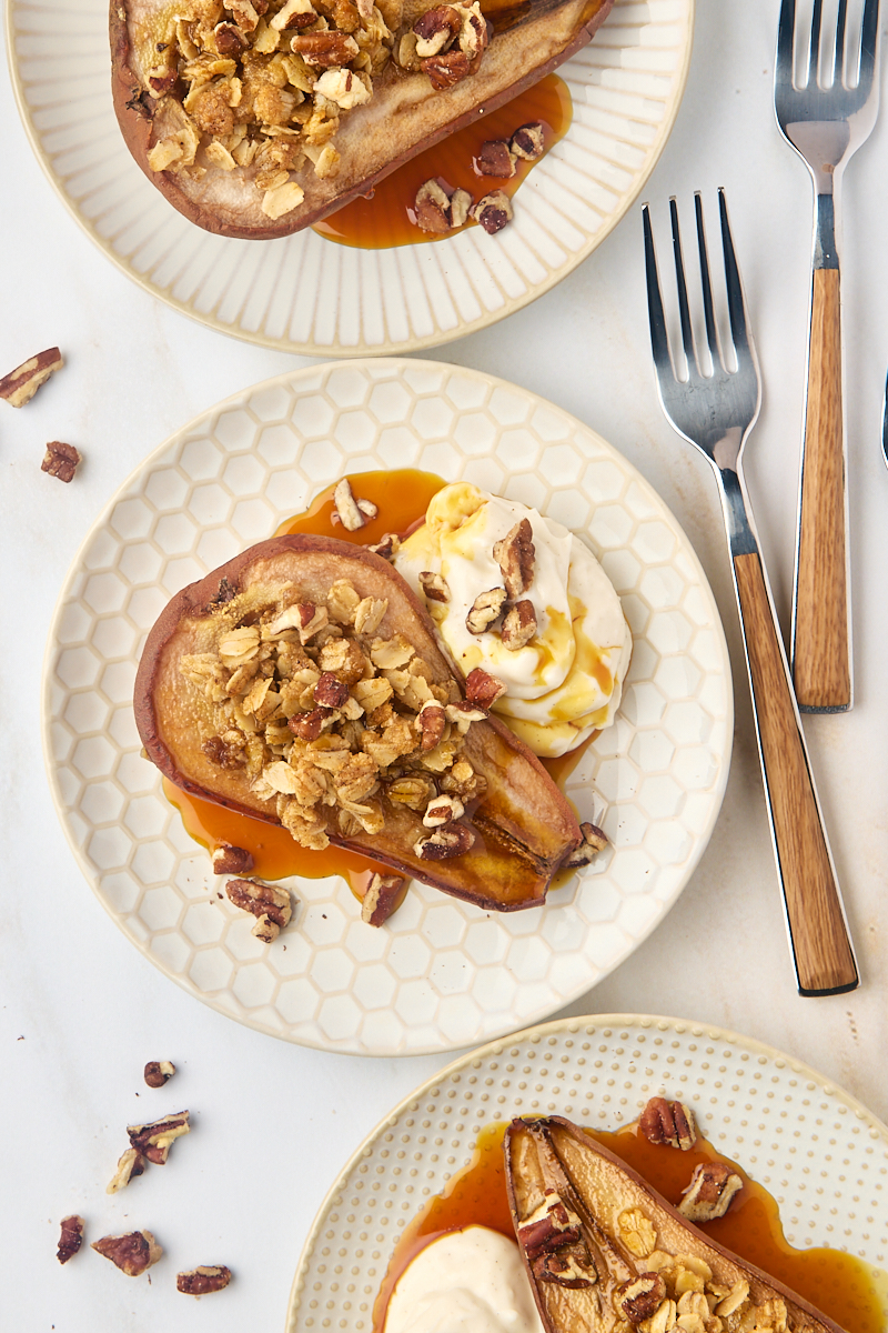 overhead view of three baked pears served on plates