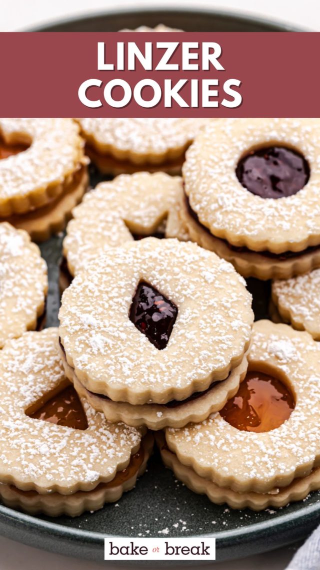 Linzer cookies on a dark gray plate; text overlay "Linzer cookies"