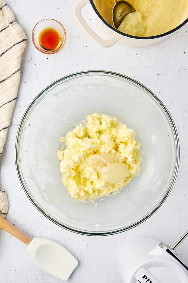 overhead view of milk mixture added to beaten butter for ermine frosting