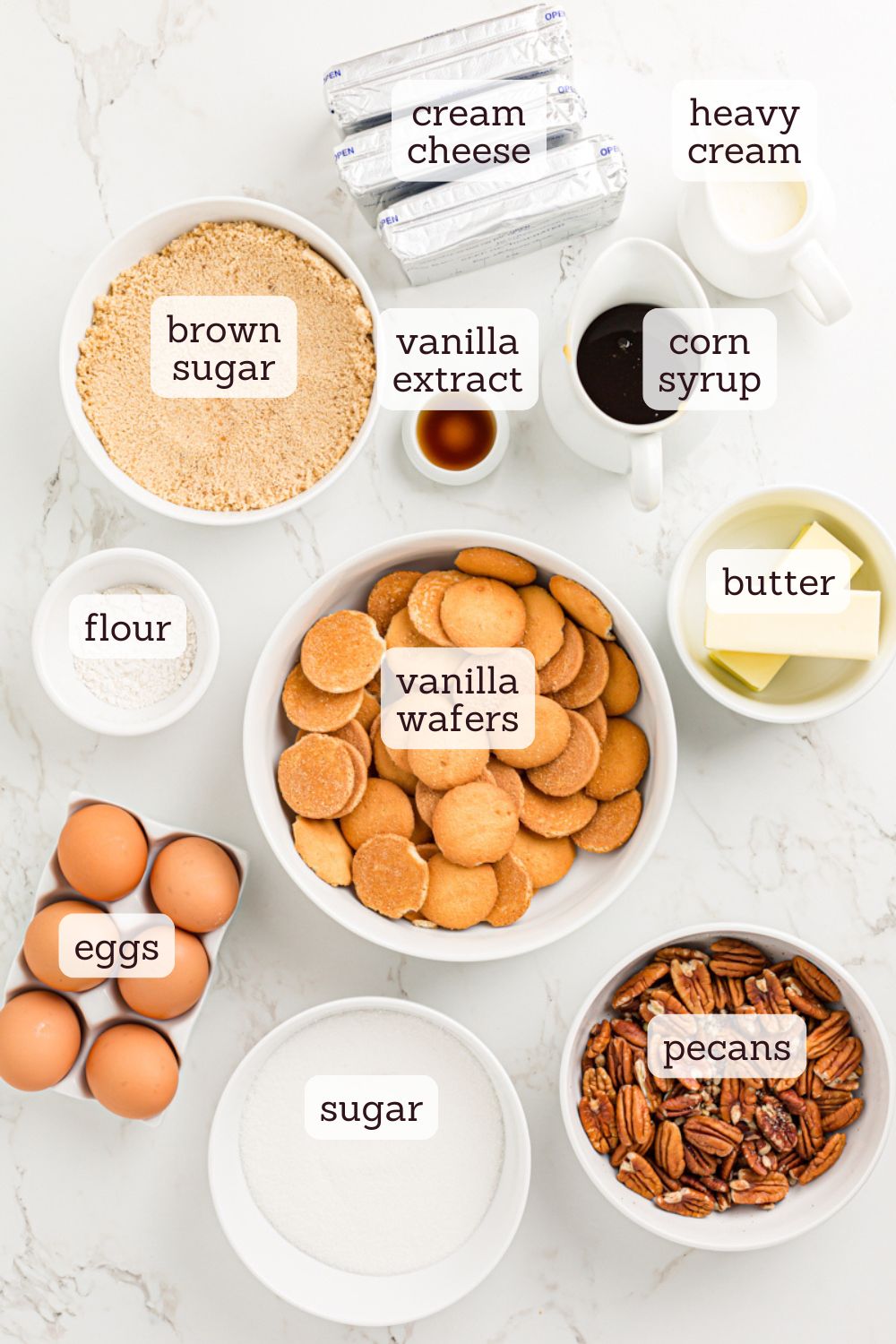 overhead view of ingredients for pecan pie cheesecake