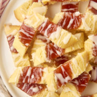 overhead view of raspberry ribbon cookies on a large white plate