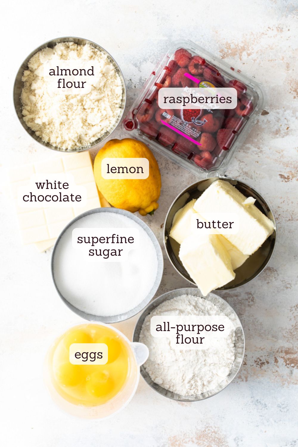 overhead view of ingredients for raspberry white chocolate almond loaf