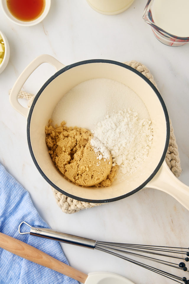 overhead view of sugar, brown sugar, and cornstarch in a saucepan